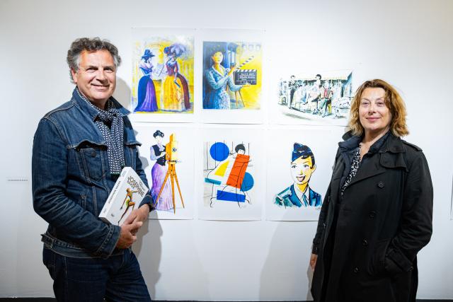 Visitors at an exhibition as part of GRAN Fest exhibition at University of Pristina