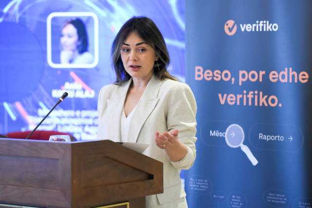 Person addressing a conference