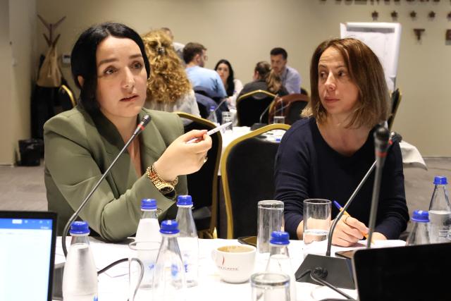 Participant discussing topics of interest in a group exercise