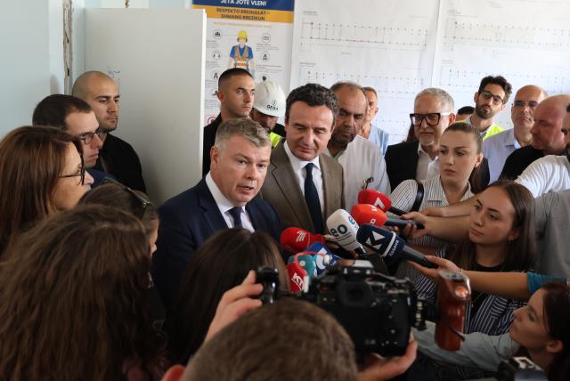 Officials speaking to the media