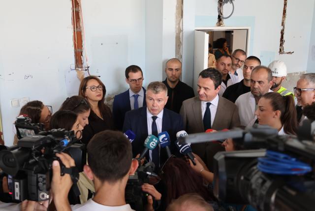 Group of high officials speaking to media 